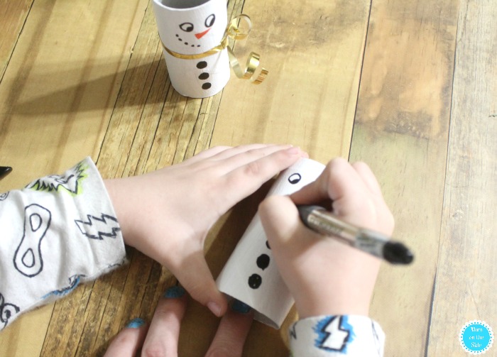 Decorating DIY Toilet Paper Tube Snowmen